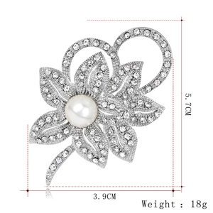 Silver flower brooch with pearls and crystals measuring 5.7cm by 3.9cm weight 18g