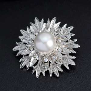 Elegant sunflower alloy brooch with white pearl center and crystals on black leather
