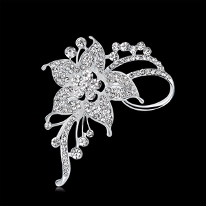 Eleganter silberfarbener Blumenbrosche mit schimmernden Kristallen und Ranken-Design