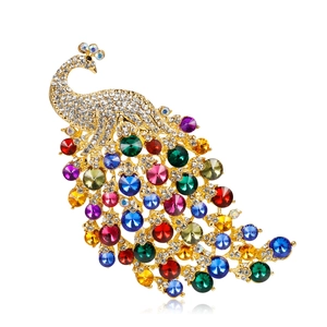 Oversized gold-plated peacock brooch with colorful crystals and sparkling rhinestones