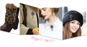Detailed view of vintage crystal brooch used as accessory on boots, coat and hat