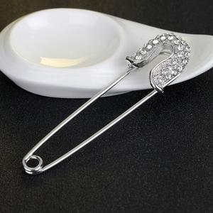 Vintage silver safety pin brooch with sparkling crystals for sweaters and scarves