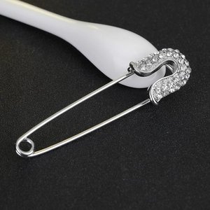 Vintage silver safety pin brooch with sparkling rhinestones for sweaters and scarves