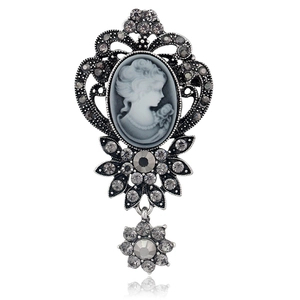 Vintage cameo brooch with black and white portrait, grey rhinestones in silver alloy