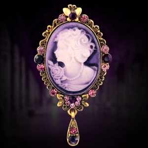 Vintage Victorian cameo brooch with purple crystal rhinestones and gold alloy frame