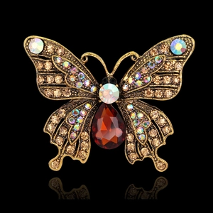 Vintage gold butterfly brooch with champagne rhinestones and red teardrop stone