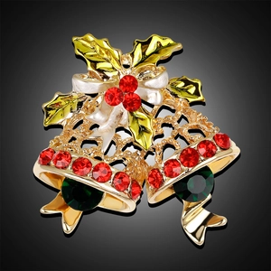 Christmas gold bell brooch with green enamel leaves and red rhinestone berries