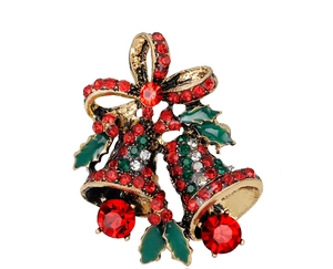 Nahaufnahme einer funkelnden Weihnachtsglocken-Brosche mit roten und grünen Strass