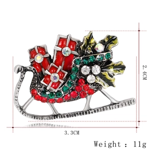 Christmas sleigh brooch with red gift box and festive rhinestones, 3.3cm width detail