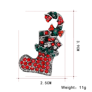 Detail view of Christmas stocking brooch with red and green rhinestones and dimensions