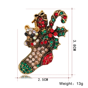 Detailed view of Christmas stocking brooch with rhinestones and precise size measurements