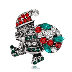 Detailed view of Santa Claus brooch featuring sparkling rhinestones and silver alloy base