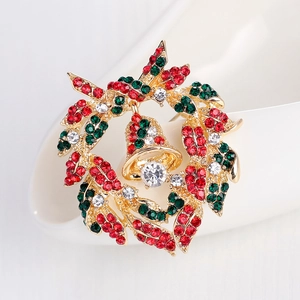 Christmas wreath brooch with red and green crystals and bells on gold metal base