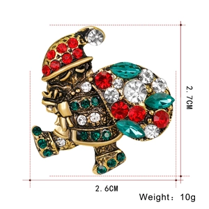 Detailed view of Santa brooch size 2.7cm by 2.6cm with colorful rhinestones