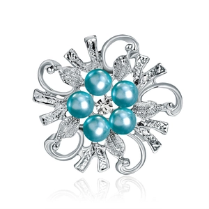 Elegant floral brooch featuring blue pearls and central crystal with silver alloy finish