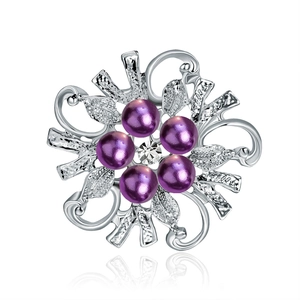Elegant flower brooch with five purple pearls and central crystal on silver metal base