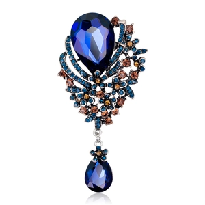 Vintage style blue rhinestone brooch with crystal pendant and silver alloy flower base