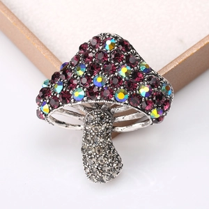 Cute mushroom brooch with purple and iridescent crystals on silver alloy base