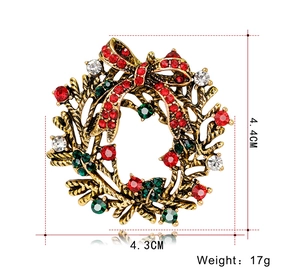 Christmas wreath brooch with colorful rhinestones measuring 4.4cm x 4.3cm