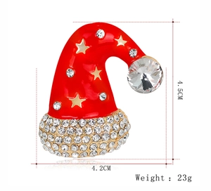 Detail view of cartoon Santa hat brooch with dimensions 4.5cm by 4.2cm and weight 23g