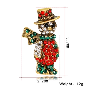 Detailed view of rhinestone snowman brooch with dimensions 3.7cm height and 2.2cm width