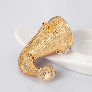 Christmas stocking brooch with golden hammer-textured back and secure safety pin clasp