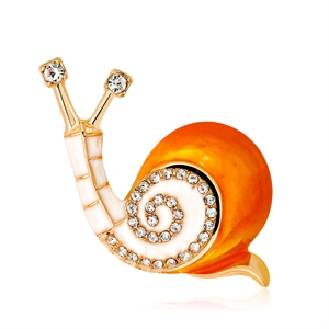 Charming gold-plated snail brooch with vibrant orange enamel and sparkling zircon accents