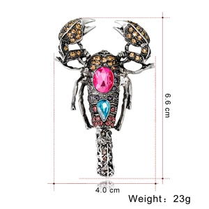 Vintage scorpion brooch with colorful rhinestones in retro silver alloy finish