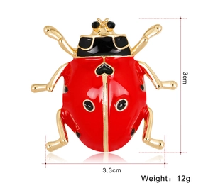 Detailed dimensions of the ladybug brooch showing 3cm height, 3.3cm width and 12g weight