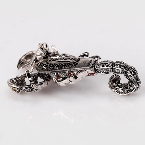 Vintage scorpion brooch in antique silver finish with red and yellow rhinestones