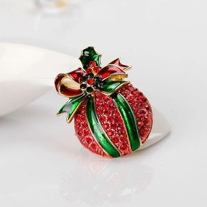 Christmas bell brooch with red rhinestones, green enamel bow and holly leaf accents