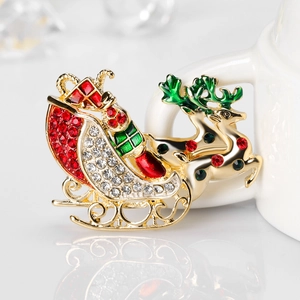 Broche traîneau de renne de Noël étincelante avec cristaux colorés et dorure de luxe