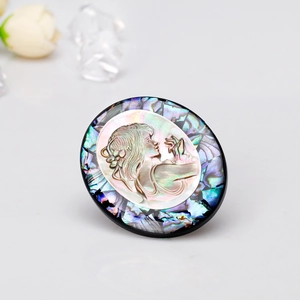 Classic oval cameo brooch with natural abalone shell and mother of pearl female profile