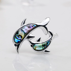 Elegant silver dolphin brooch featuring natural colorful abalone shell inlay for women
