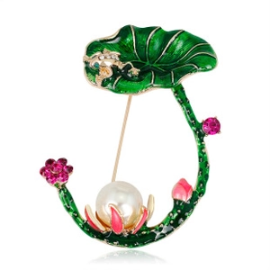 Detail of floral lotus leaf brooch with green enamel, a gold frog, and a large white pearl