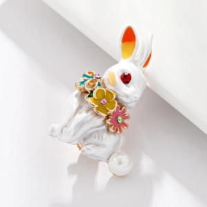 Creative rabbit brooch with white enamel, colorful floral neck, and pearl tail accent
