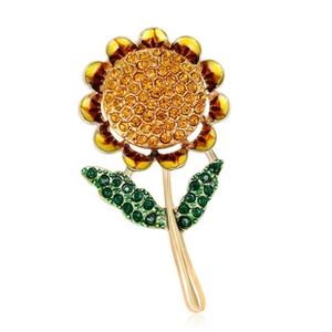 Exquisite sunflower brooch with yellow crystals and golden petals on white background