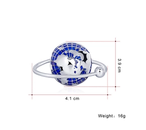 Detail showing dimensions of blue enamel globe brooch with a creative orbital design