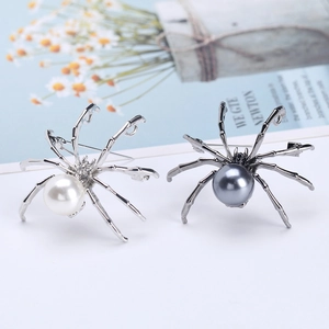 Spider pearl brooch with rhinestone accents in silver and gun-black alloy finish