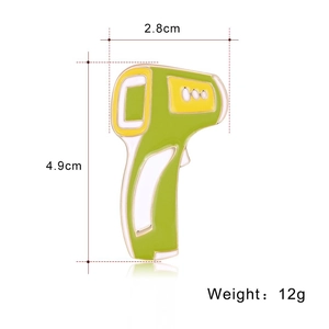 Detail showing dimensions of medical thermometer brooch in green and yellow enamel