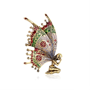 Vintage gold butterfly fairy brooch pin with colorful enamel wings and filigree details