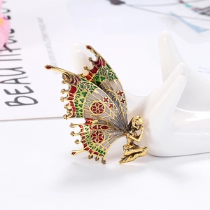 Retro butterfly fairy brooch with colorful enamel wings and vintage gold alloy finish