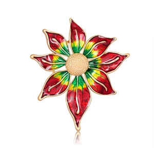 Détail d'une broche fleur en émail coloré avec cœur doré et pétales en métal dégradé