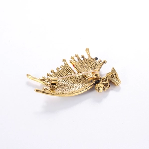 Vintage gold butterfly angel brooch with intricate textured alloy pattern back view