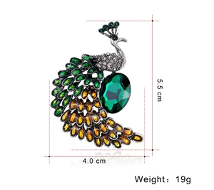 Détails de broche paon montrant 5,5cm de hauteur et 4,0cm de largeur, poids 19g