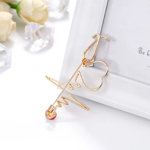 Golden stethoscope heart brooch with red drip oil electrocardiogram design for medical staff