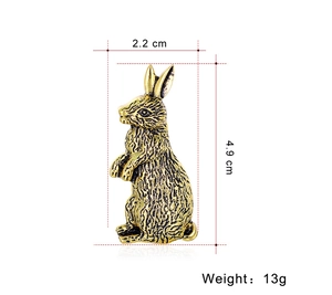 Detail view of vintage gold rabbit brooch with 4.9cm height and 2.2cm width dimensions