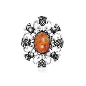 Vintage geometric alloy brooch with amber resin stone and Scottish thistle design