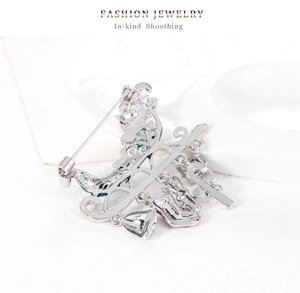 Detailed back view of Christmas car brooch with silver alloy pin and safety clasp