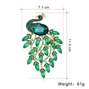 Vintage green peacock brooch in gold alloy with emerald rhinestones, 11.5cm by 7.1cm